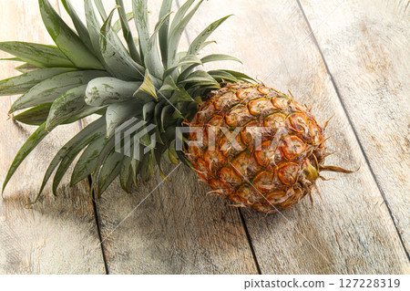 Tropical sweet exotic Pineapple fruit 127228319