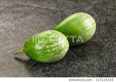 Ripe green mini eggplants heap 127228328