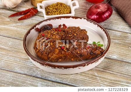 Baked pork tenderloin with mustard 127228329