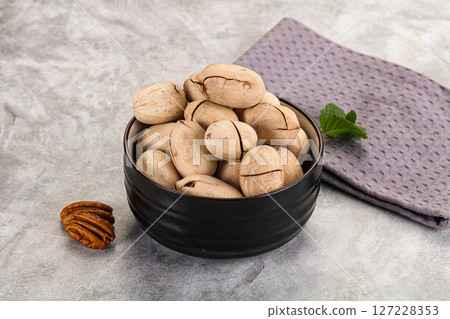 Crunchy pecan nut in the bowl 127228353