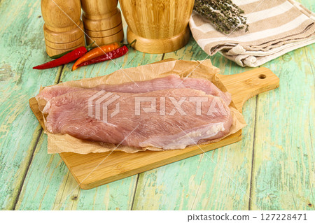Raw turkey breast fillet steak 127228471