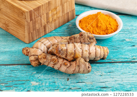 Fresh aroma tumeric roots heap Fresh aroma tumeric roots heap 127228533