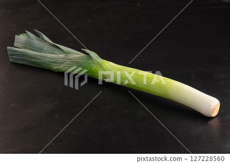 Raw ripe green leek onion Raw ripe green leek onion 127228560