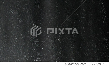 Rain Shower Curtain Texture Bathroom: Dark, wet fabric texture close-up showing water droplets, likely in a bathroom setting. 127229159