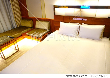 Gorgeous hotel room with a double bed 127229213