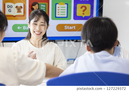 Children taking English classes 127229372