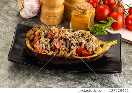 Baked eggplant stuffed meat and tomato 127229461