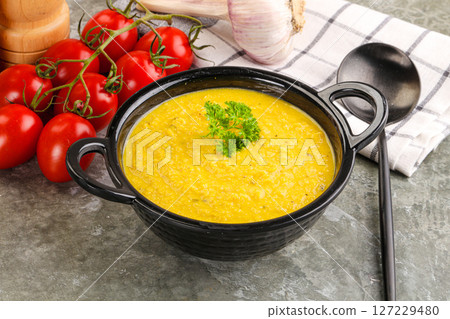 Vegetarian corn cream soup served parsley Vegetarian corn cream soup served parsley 127229480