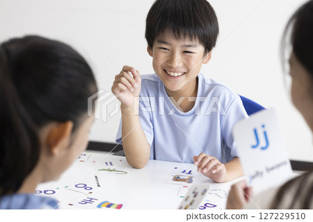 Children taking English classes Children taking English classes 127229510