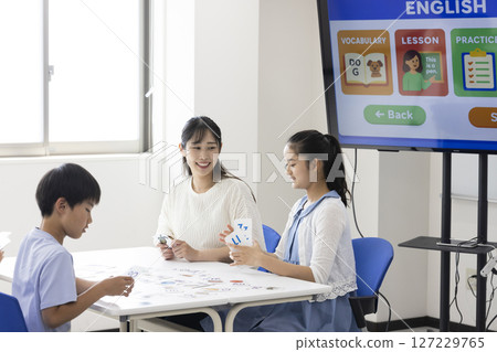 Children taking English classes Children taking English classes 127229765
