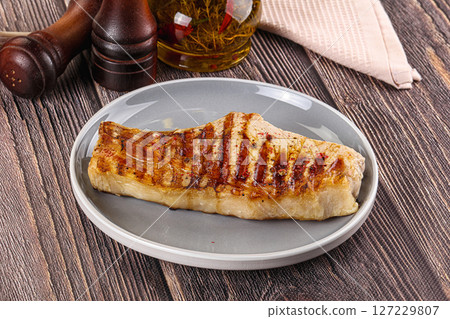 Tasty hot grilled pork loin 127229807