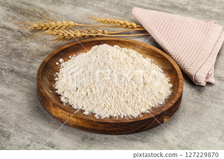 Wheat flour for cooking in the bowl Wheat flour for cooking in the bowl 127229870