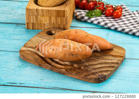 Ripe raw batat unpeeled roots 127229880