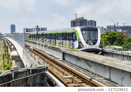 A Green Line train running on the elevated track of the Taichung Rapid Transit System in Taiwan. A Green Line train running on the elevated track of the Taichung Rapid Transit System in Taiwan. 127229912