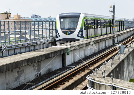 A Green Line train running on the elevated track of the Taichung Rapid Transit System in Taiwan. A Green Line train running on the elevated track of the Taichung Rapid Transit System in Taiwan. 127229913