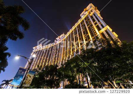 Beautiful night view of Galaxy Entertainment Group a hotel casino resort on the Cotai Strip in Macau, China. 127229920