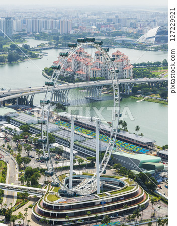 Overlook view of the Singapore Flyer from the Marina Bay Sands Skyway, Singapore, is Asia's tallest Ferris wheel. 127229921