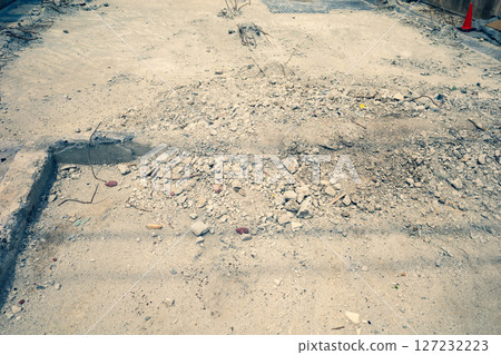 Demolition of a house: Concrete and rebar in the basement b-3 Emphasis on warm and cool colors 127232223