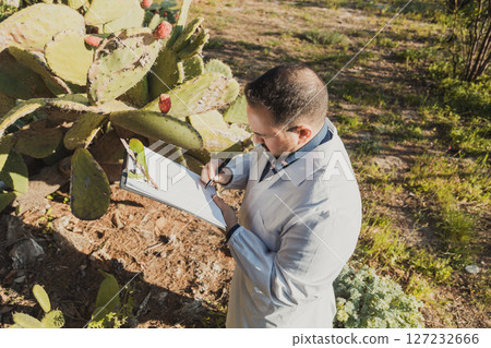 Herborist Writing Datas About The Analysis Of The Plants 127232666