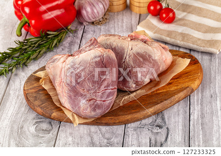 Uncooked raw fresh pork heart Uncooked raw fresh pork heart 127233325