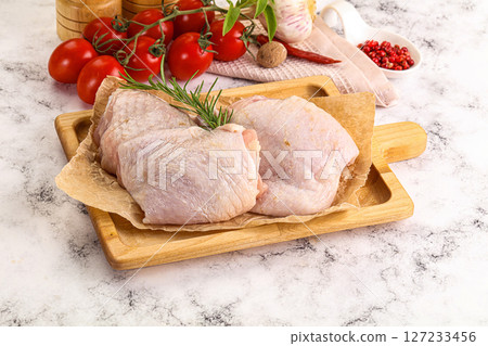 Raw chicken thighs for cooking 127233456