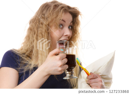 Funny woman being late drinking coffee 127233868