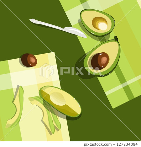 Bakground with diifferent pieces of avocado on the tablecloth. Bright green whole fruit , half, slice, with bone. Bakground with diifferent pieces of avocado on the tablecloth. Bright green whole fruit , half, slice, with bone. 127234084