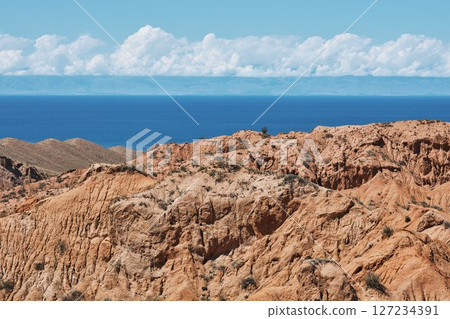 Skazka canyon, view on southern shore of Issyk-Kul lake, Kyrgyzstan 127234391