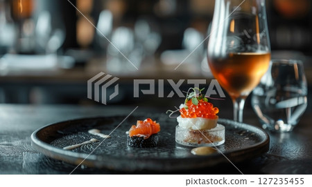 Icelandic hakarl, fermented shark meat with a shot of Brennivin schnapps. A daring Icelandic appetizer experience. 127235455