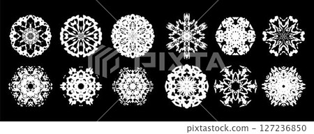 The image is a set of twelve different snowflakes, all in vector format. Each snowflake has a unique pattern, showcasing the intricate and symmetrical details that are typical of snowflakes. The image is a set of twelve different snowflakes, all in vector format. Each snowflake has a unique pattern, showcasing the intricate and symmetrical details that are typical of snowflakes. 127236850