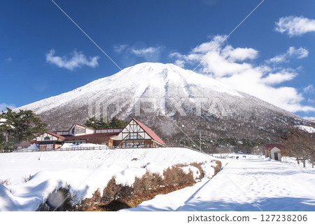 Snowshoe trekking image with Mt. Oyama in the background 127238206