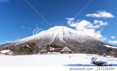 Snowshoe trekking image with Mt. Oyama in the background 127238209