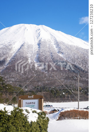 Snowshoe trekking image with Mt. Oyama in the background 127238210