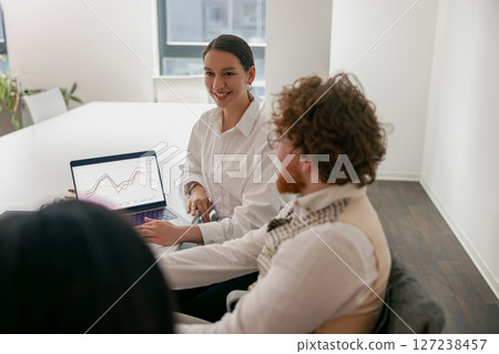 Engaging Business Meeting to Discuss Data Analysis in a Modern Office Setting with Teams Engaging Business Meeting to Discuss Data Analysis in a Modern Office Setting with Teams 127238457