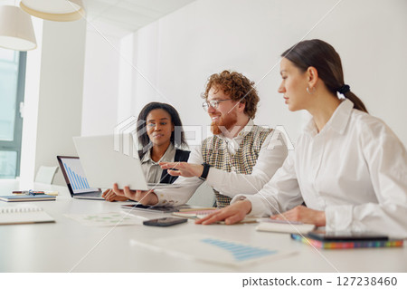 Join us for a Collaborative Team Meeting in our dynamic and modern office space setting Join us for a Collaborative Team Meeting in our dynamic and modern office space setting 127238460