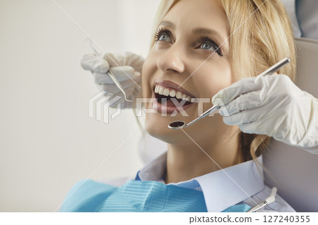 Woman Patient At Dentist For Oral Checkup In Clinic Woman Patient At Dentist For Oral Checkup In Clinic 127240355