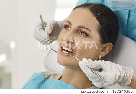 Dentist Examining Woman Patient Oral Care In Hospital Dentist Examining Woman Patient Oral Care In Hospital 127240396