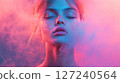 Locked on a cloud of smoke, with a pink and blue pastel-colored background, a minimal concept studio photograph. 127240564