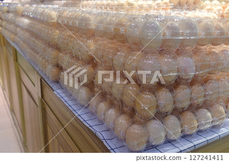 Eggs neatly arranged in the supermarket Eggs neatly arranged in the supermarket 127241411