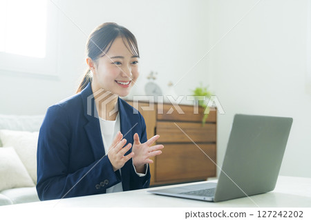 Young woman in a suit 127242202