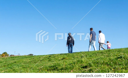 Couple walking on the hill 127242967