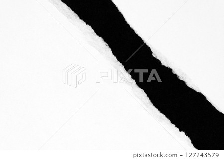 White ripped paper isolated on black background 127243579