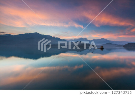Sun Moon Lake scenery, beautiful lake view and fantastic sunrise sky. A famous tourist attraction in Nantou, Taiwan, Asia. 127243735