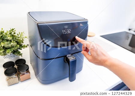 Air fryer machine in the kitchen 127244329
