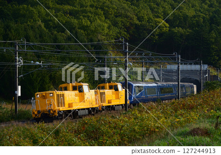 THE ROYAL EXPRESS passing through the Arashiyama Tunnel early in the morning and changing direction before being sent to Takikawa 127244913