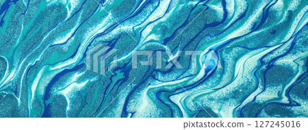 Fluid art background in turquoise, blue and glitter colors with marble texture and acrylic painting style Fluid art background in turquoise, blue and glitter colors with marble texture and acrylic painting style 127245016