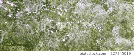 Green watercolor texture background with white paint splashes and stains for design, macro. Olive wallpaper 127245019