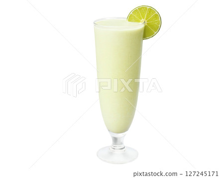 Coconut Lime Smoothie A creamy, tropical smoothie made with coconut milk, lime juice, and ice. The drink is smooth 127245171