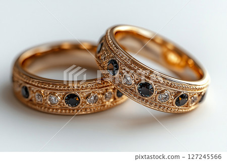 Luxury pair of Wedding Rings on a white background. Rococo Renaissance style. 127245566