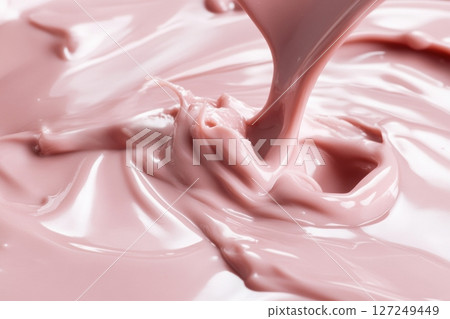 Pink milk splashes, drops. Strawberry milk shake pour. Pouring cream. Creamy wave in a minimalist setting. Soft light, clean design. Splatter of thick liquid swirl. Drink texture ideal for advertising Pink milk splashes, drops. Strawberry milk shake pour. Pouring cream. Creamy wave in a minimalist setting. Soft light, clean design. Splatter of thick liquid swirl. Drink texture ideal for advertising 127249449